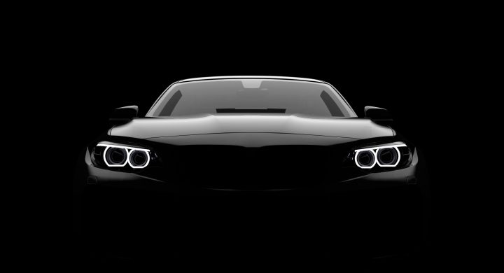 Front view of a generic and brandless modern car on a black background. 3D illustration